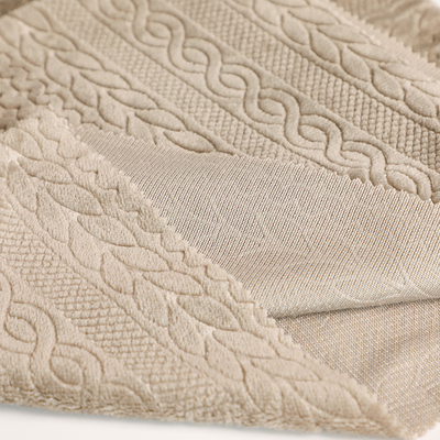 Polyester 100% latéral simple de relief de tissu d'ouatine de flanelle