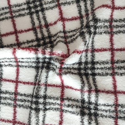 Le plaid 100% de polyester a imprimé le tissu de Sherpa pour le style classique de vêtement couvrant de jouets