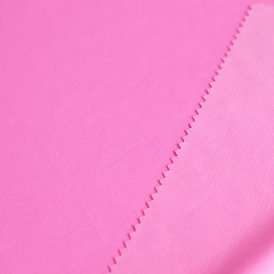 Le T-shirt simple tricotent la plaine rose du tissu de coton 100gsm