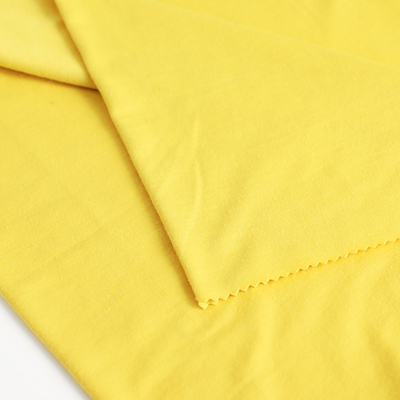 Le coton a tricoté le tissu simple 100gsm de débardeur pour la chemise met en sac le revêtement