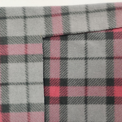 Le plaid a imprimé le classique micro de tissu d'ouatine polaire pour des écharpes que les gants s'habillent